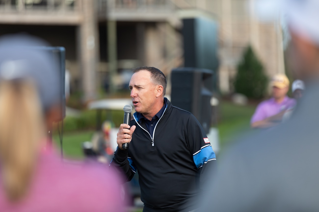Todd Kolb speaks at the announcement of the Sanford POWER Golf Academy