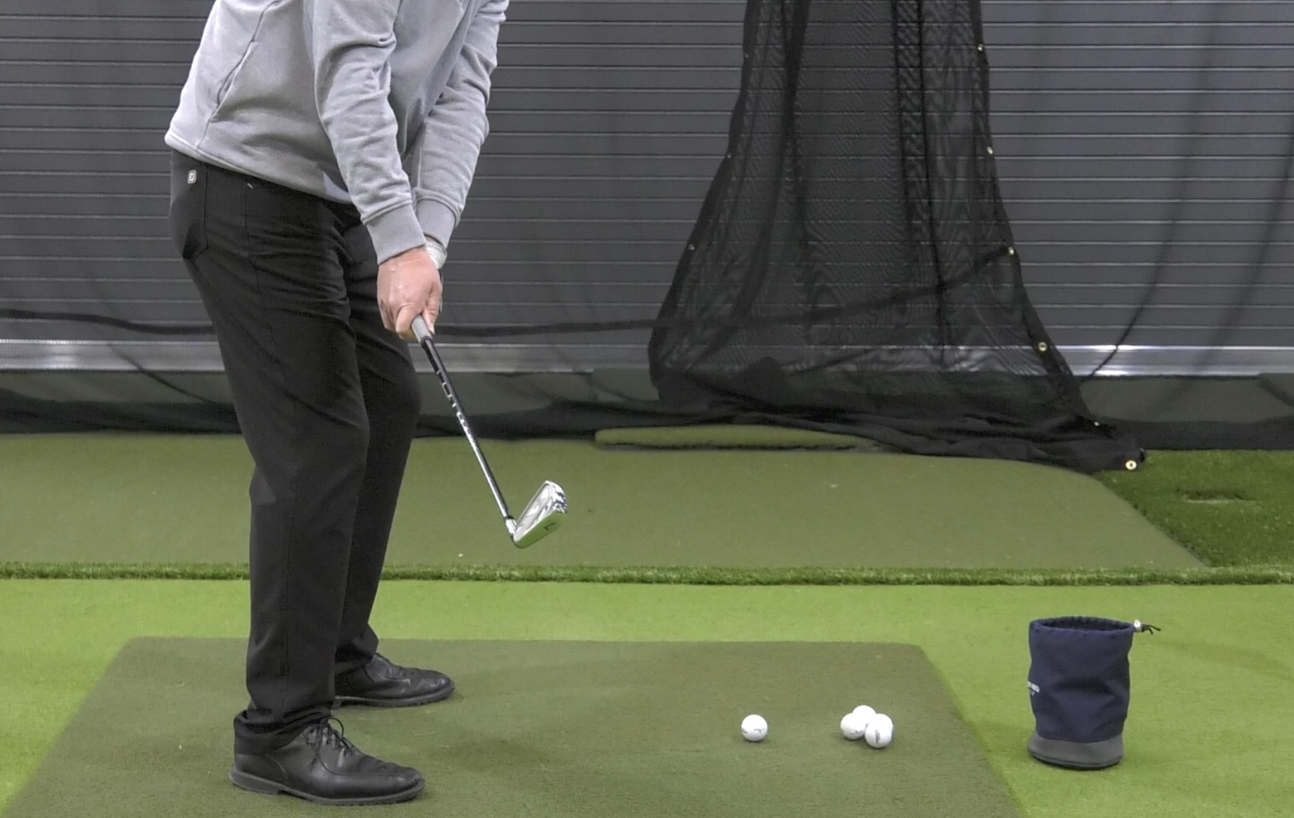 A golfer showing the wrist movement drill