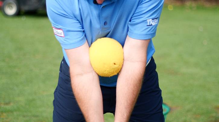 A simple ball can help you work on your golf backswing